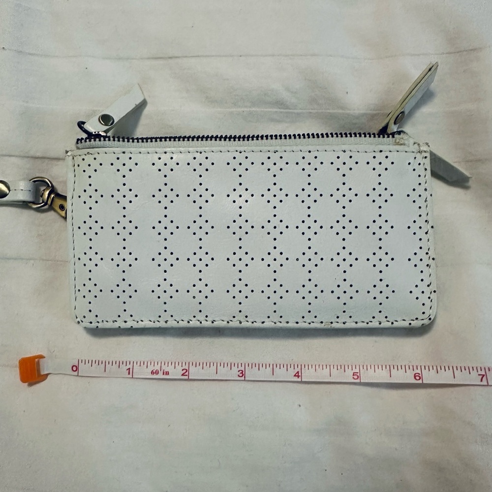 Latico White Perforated wristlet